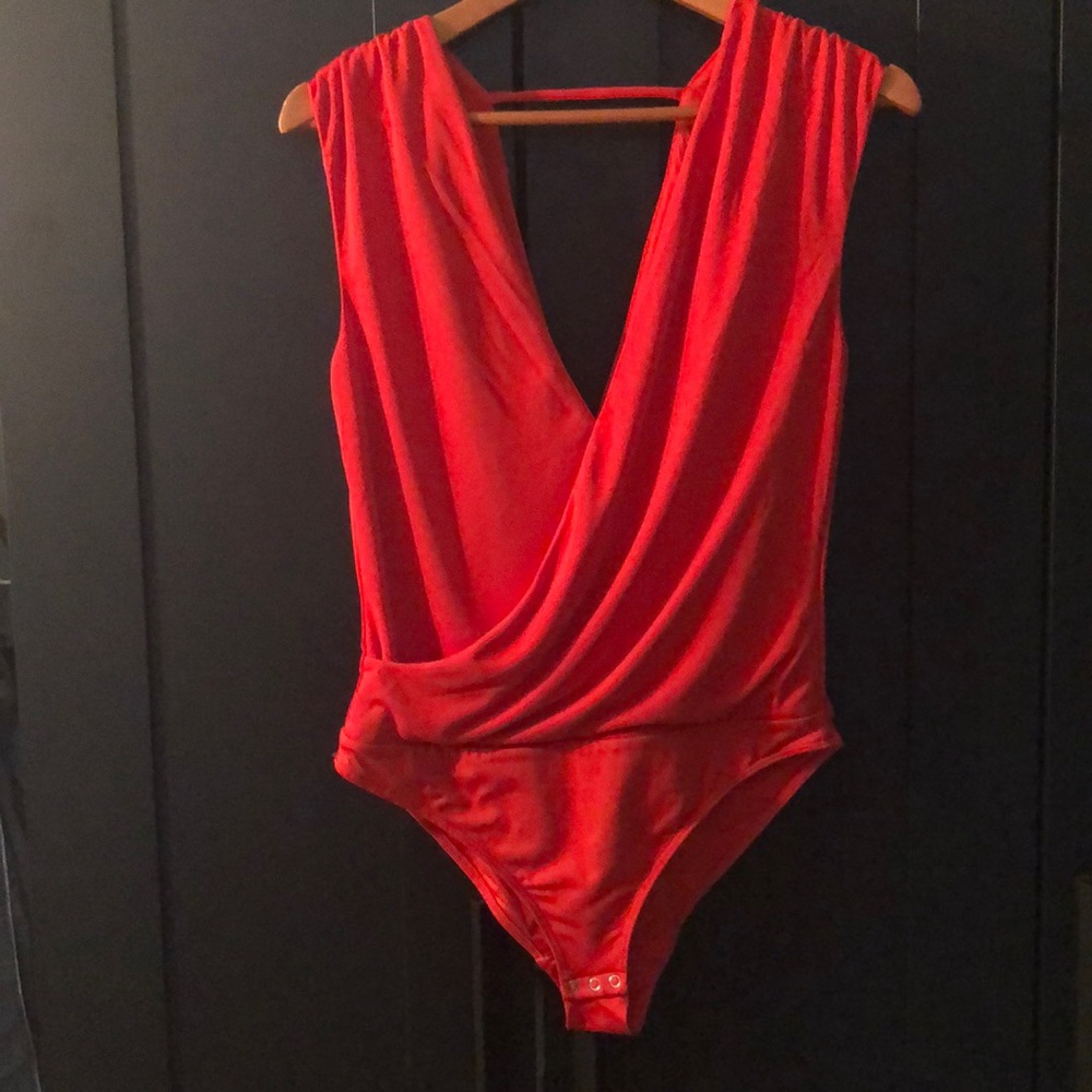 Draped wrap-over body suit